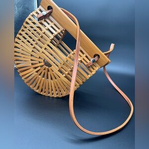 Arc-Shaped Woven Bamboo Crossbody Bag with Tan Strap